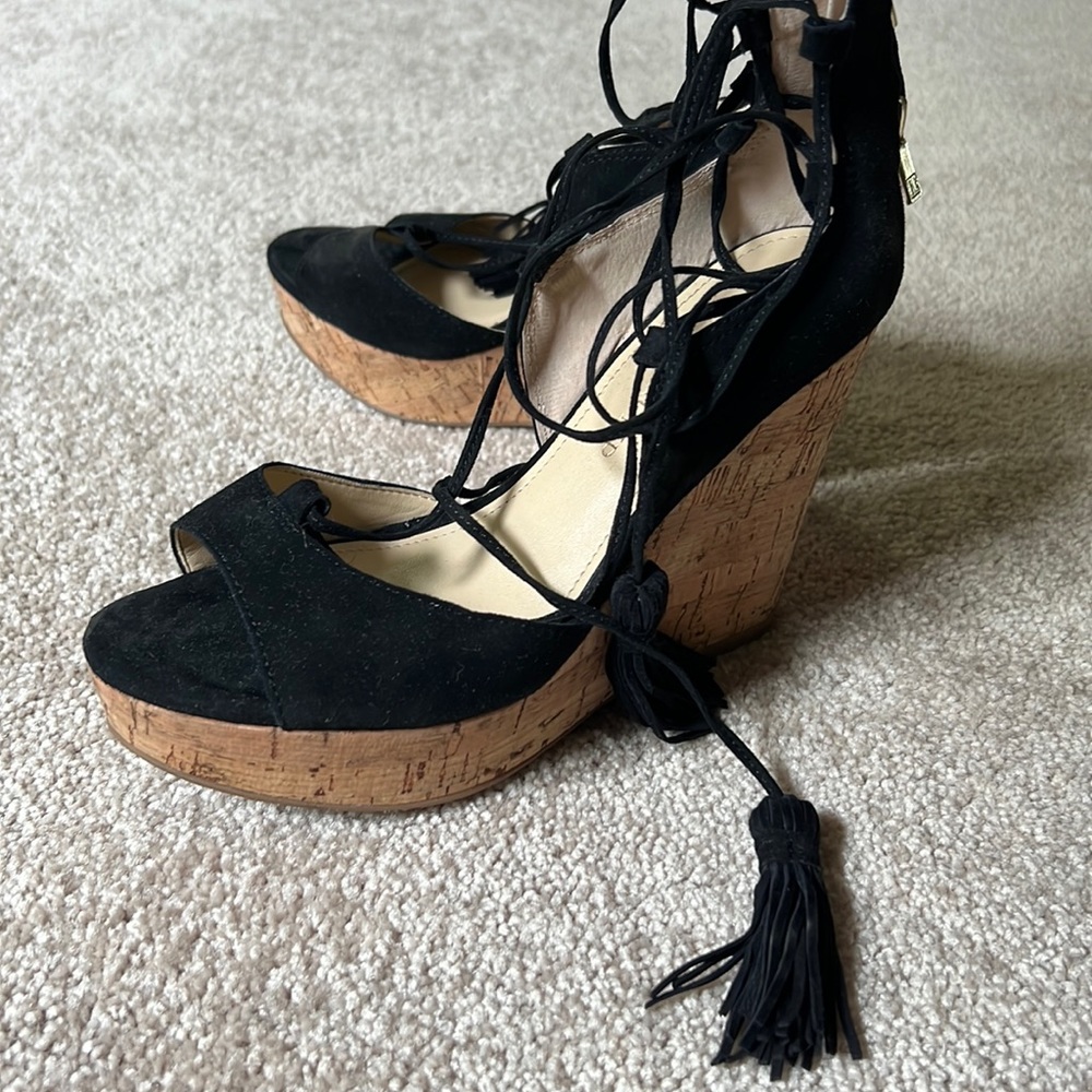 Excellent condition. Cork wedge black heel size 6.5. Worn once.